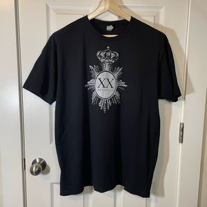 Next Level black promo tee for ‘XX’ by John Varvatos w/ silver graphics sz XL